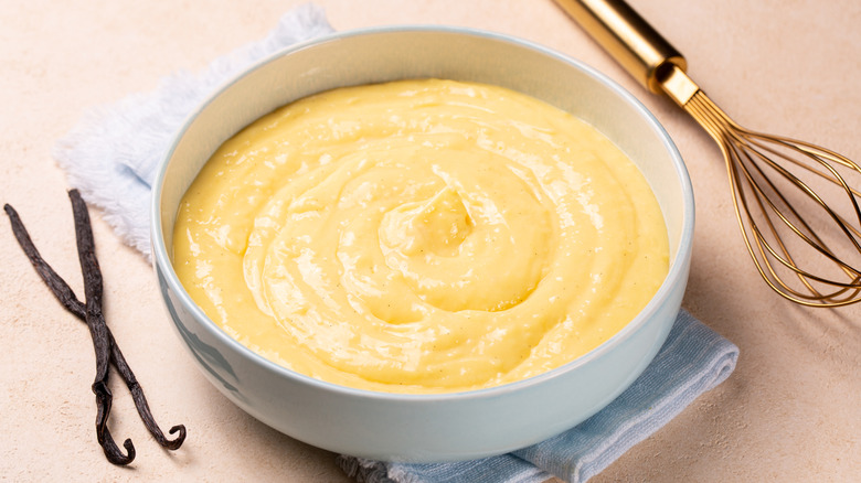 Vanilla pastry cream or custard cream in a light blue bowl