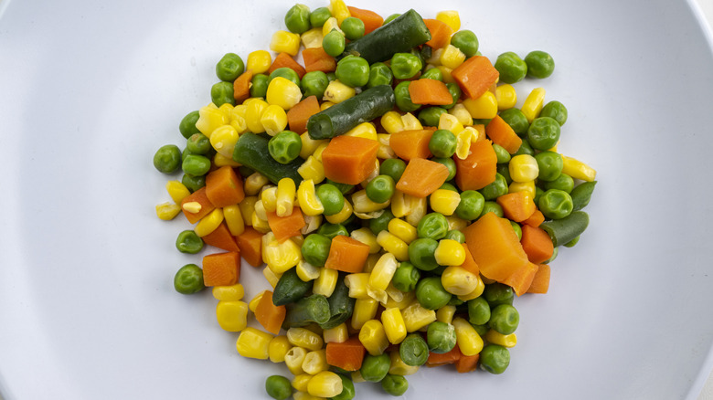 Bowl of frozen mixed veggies with corn
