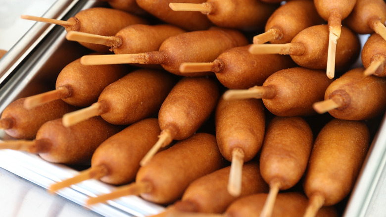 Tray with a pile of corn dogs
