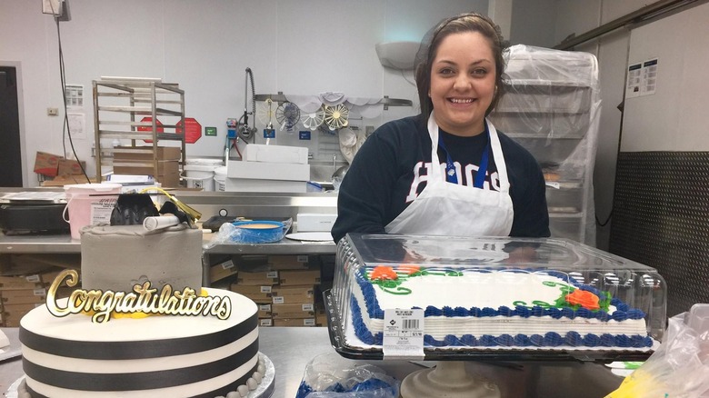 Cake decorator at Sam's Club bakery.