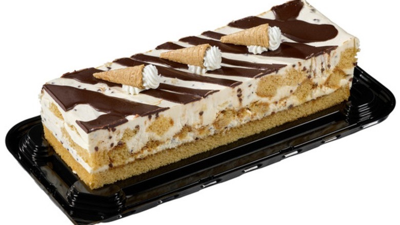 Kirkland Signature Waffle Cone Bar Cake on a black plastic base on a white background.