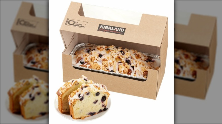Kirkland Signature Lemon Blueberry Loaf in a brown cardboard bakery box on a white background.