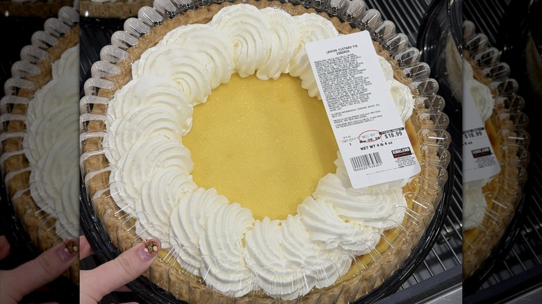 Hand holding a Costco lemon custard pie from Costco's bakery