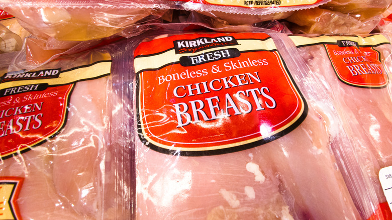A closeup of packaged chicken breasts from Kirkland at Costco