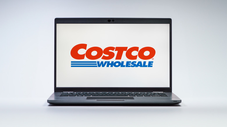 Laptop reading Costco logo on a white background