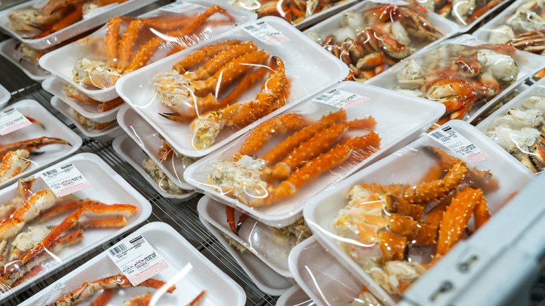 packages of crab legs in Costco freezer display