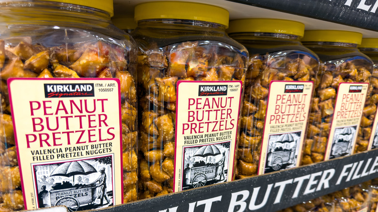 3-pound container of Kirkland Signature Peanut Butter Pretzels on Costco shelf