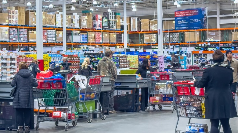 Costco shoppers in check out lines