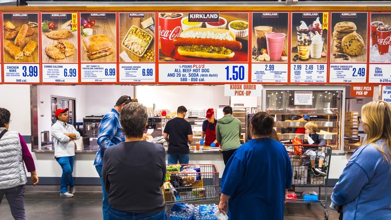 People standing around Costco food court