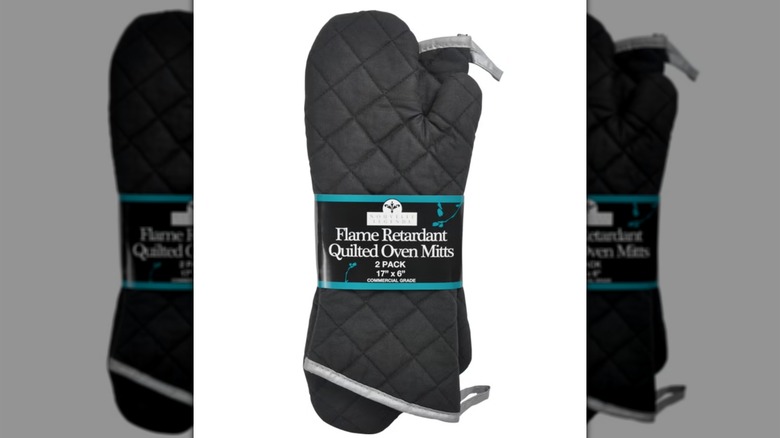 Black Nouvelle Legende Flame Retardant Quilted Oven Mitts from Costco on white background