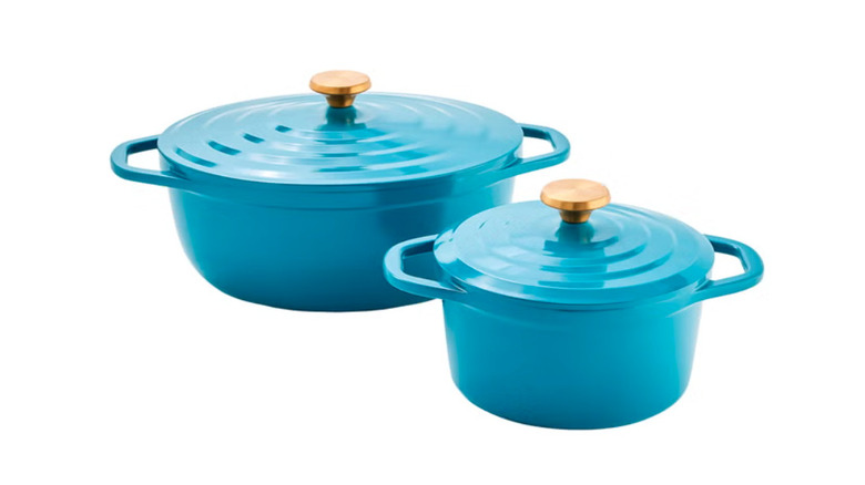 Two blue T-fal cast aluminum Dutch ovens on white background