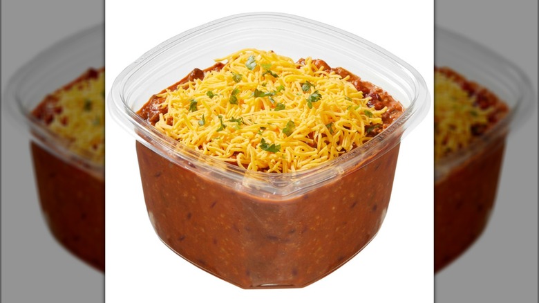A container of the Kirkland Signature Beef Chili from Costco's deli section on a white background.