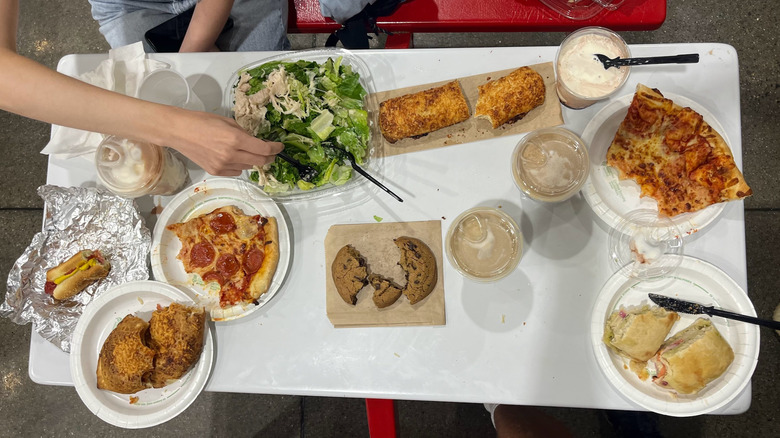 A medley of half-eaten foods at the Costco food court