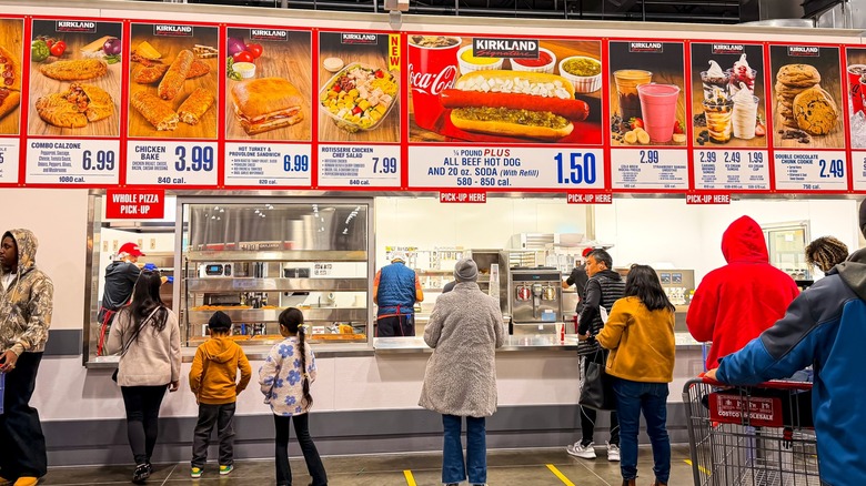 People ordering at the Costco food court