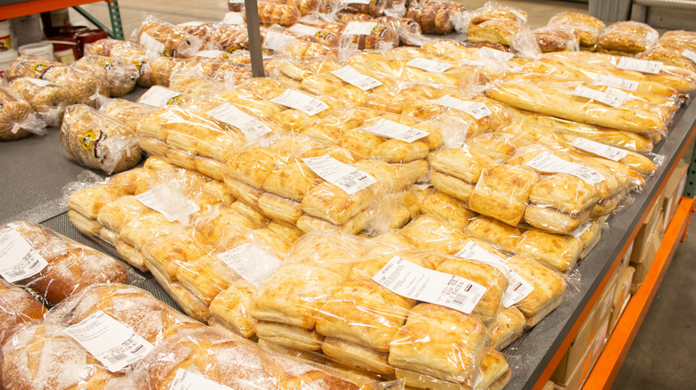 Bags of Kirkland Signature Artisan Rolls in Costco