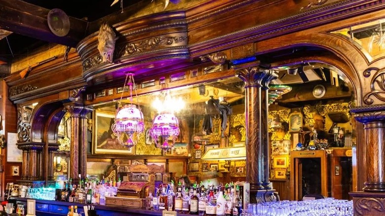 A view of the bar and ceiling details at the Silver Dollar Saloon