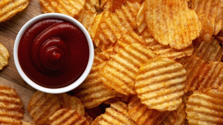 Barbecue potato chips, visibly thick and crunchy-looking.