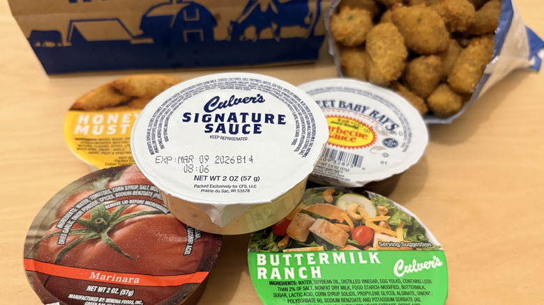 Culver's dipping sauces with cheese curds in the background
