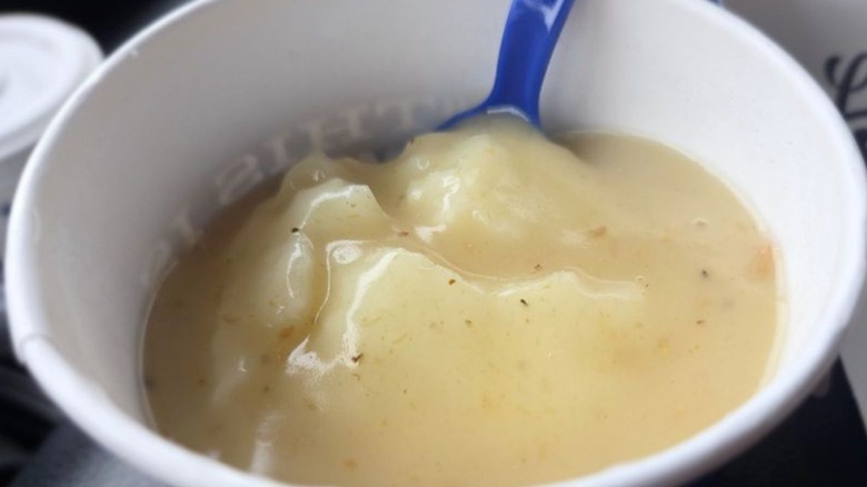 Culver's mashed potatoes and gravy in a to-go container