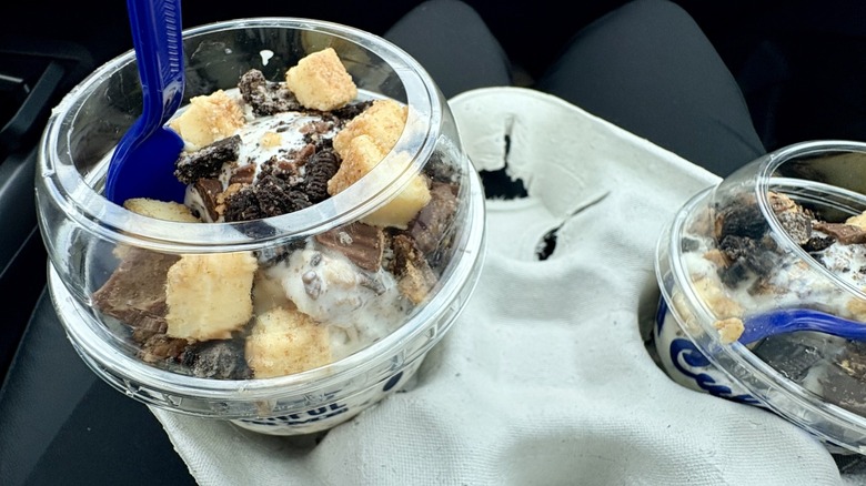 A closeup of Culver's Oreo Reese's Cheesecake frozen custard to go