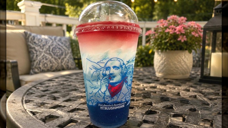 Sonic's Red, White, and Blue Slush Float on a table outside.