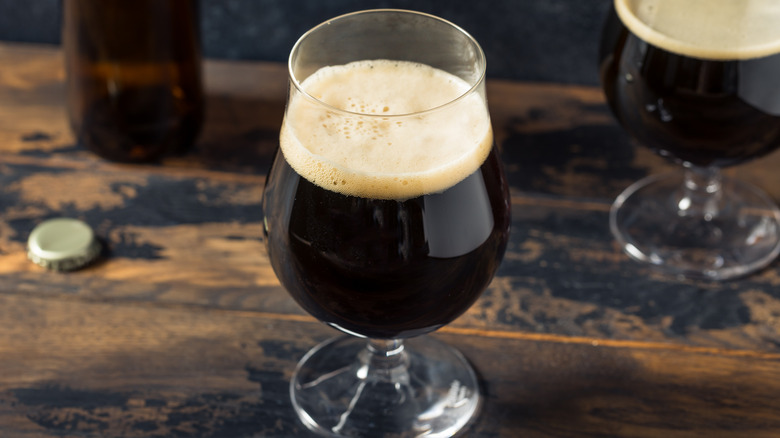 Glasses of stout on table