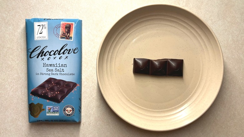 Chocolove Hawaiian Sea Salt in Strong 72% Dark Chocolate and chocolate on plate