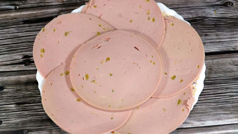Slices of olive loaf arranged on a plate