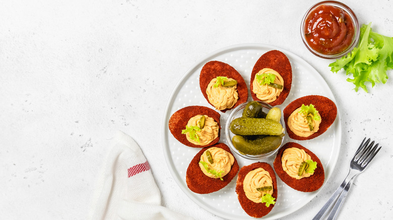 deviled eggs with pickles and barbecue sauce