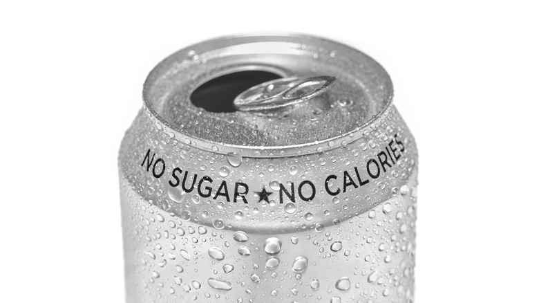 A pop can that displays the label of no sugar and no calories