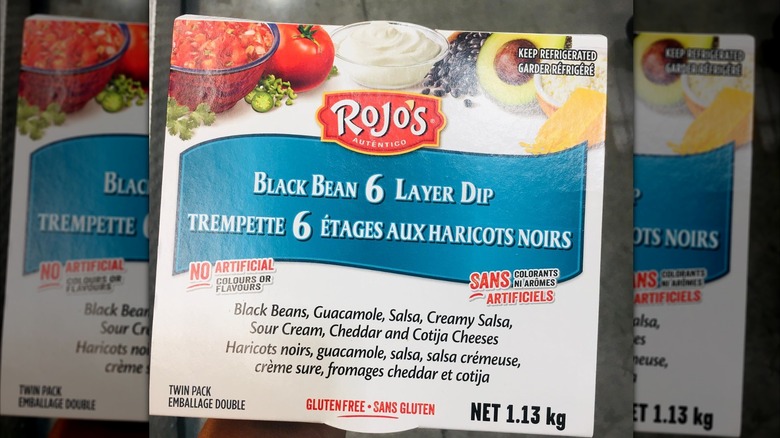 Close up of packaging of Rojo's Black Bean 6 Layer Dip