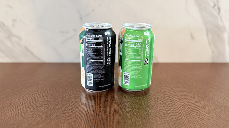 Backs of the two mountain dew dirty cream soda cans with nutritional info