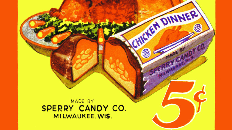 A vintage drawn advertisement of a Chicken Dinner candy bar with a roasted chicken meal on a platter