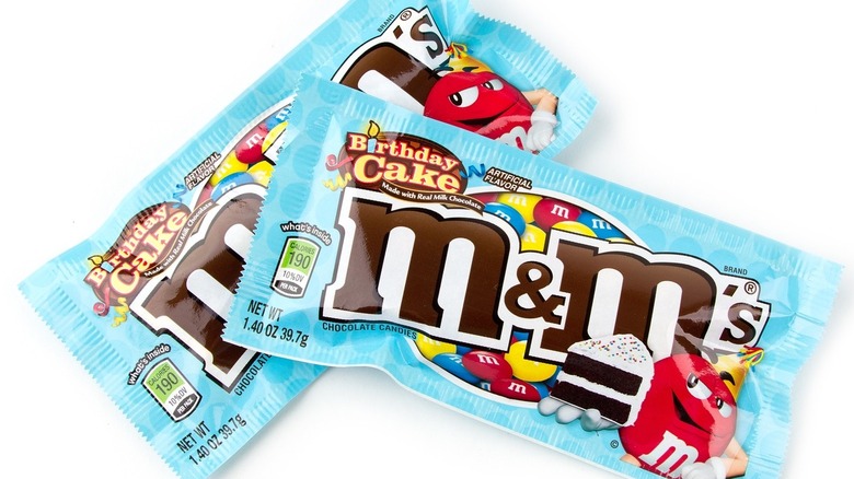 Two bags of discontinued birthday cake flavor M&M's