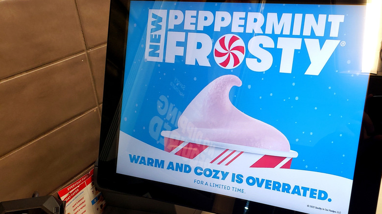 Screen at Wendy's advertising a peppermint Frosty