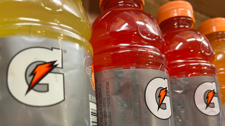 Stock photo of bottles of Gatorade on a store shelf.