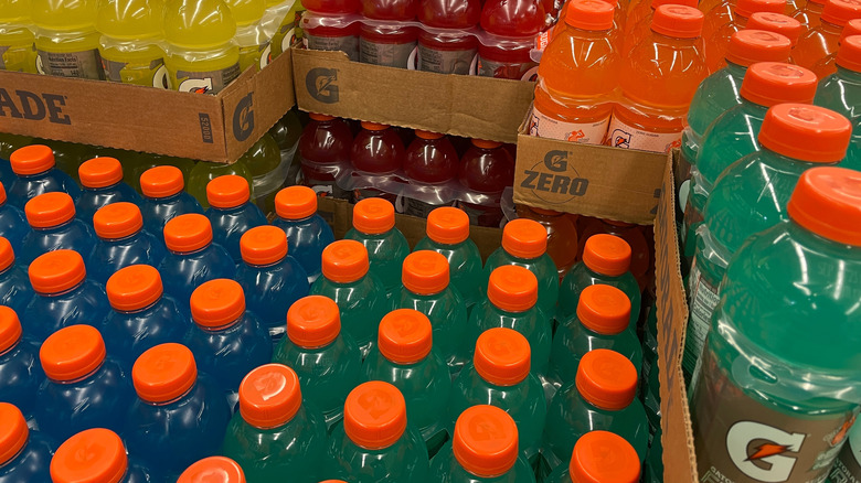 Stock photos of a range of blue Gatorade bottles, arranged in boxes.