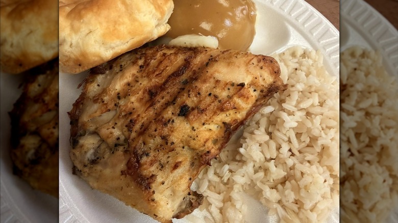 Plate with KFC Grilled Chicken, rice, biscuit, and gravy