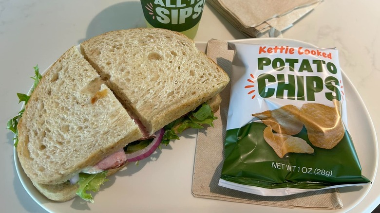 Deli Ham Sandwich with chips and drink