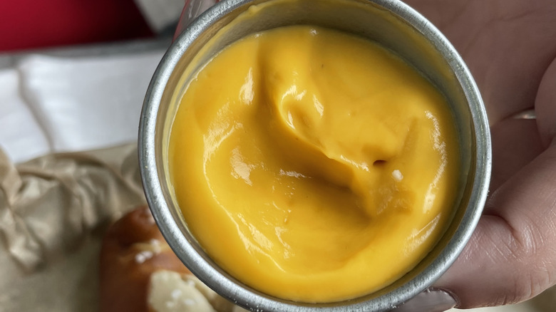 mustard in small metal ramekin
