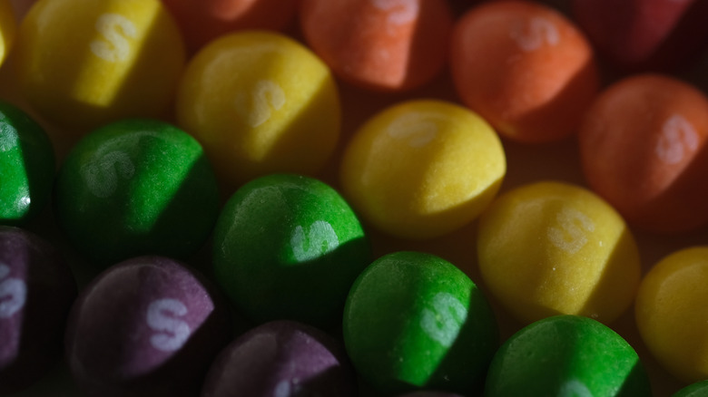 Rows of Skittles candies