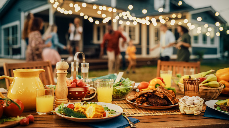 A beautiful spread of foods laid out on an outdoor table