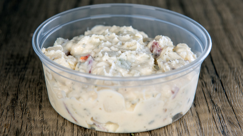 Potato salad in a plastic container