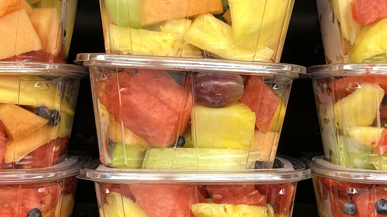Containers full of pre-cut fruit