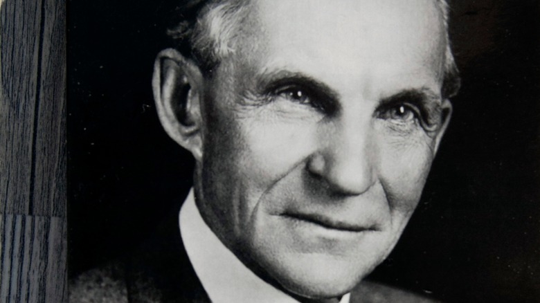 A black and white photo of Henry Ford