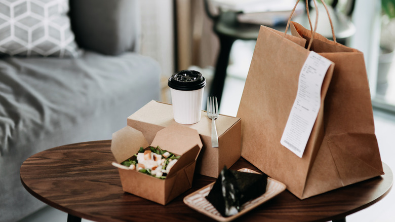 Takeout food and drink on a table