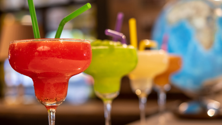 A row of frozen cocktails