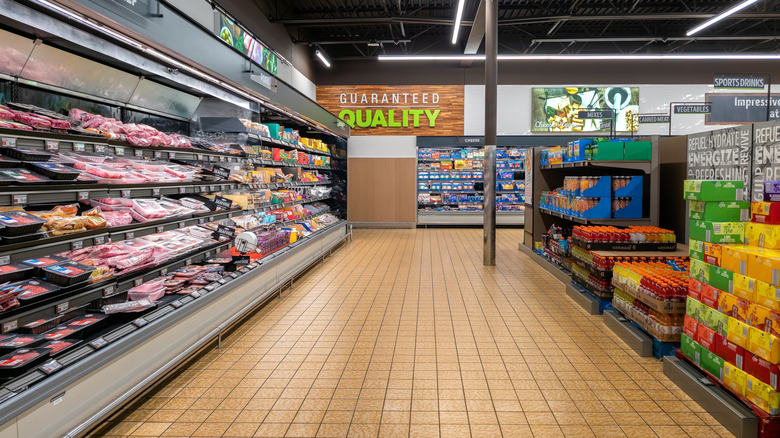 An aisle of meat and grocery products at an Aldi location