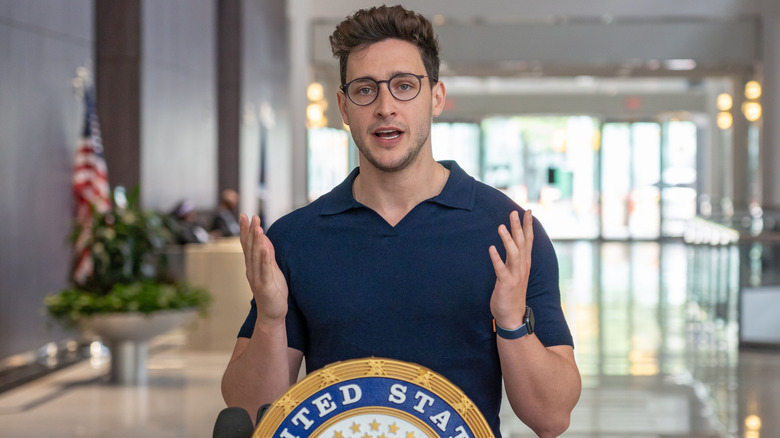 Doctor Mike at a United States podium in a government building