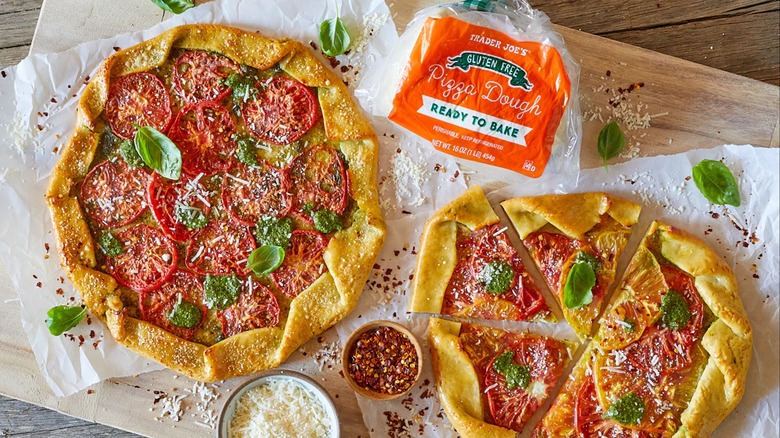 A top-down view of two pizzas made out of Trader Joe's gluten-free pizza dough.